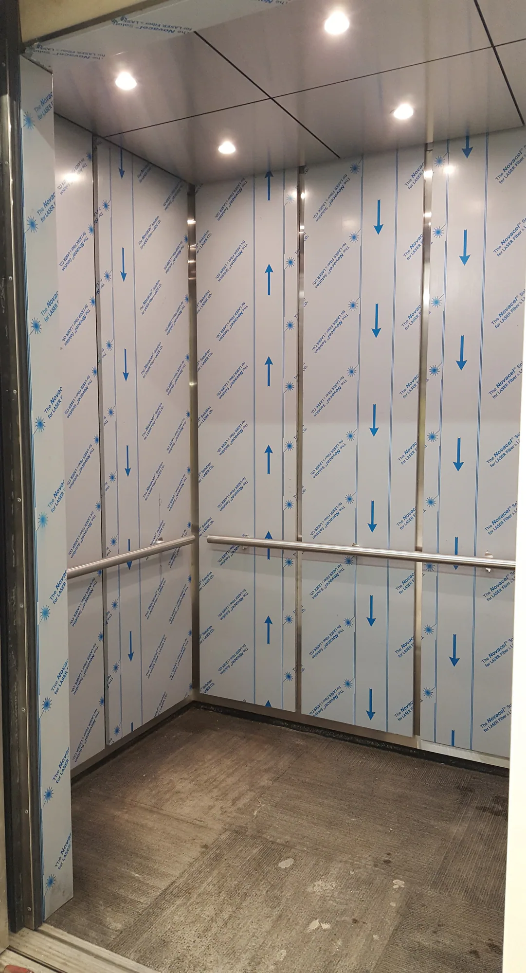 Woodson Library elevator cab in Chicago with patterned protective wall panels
