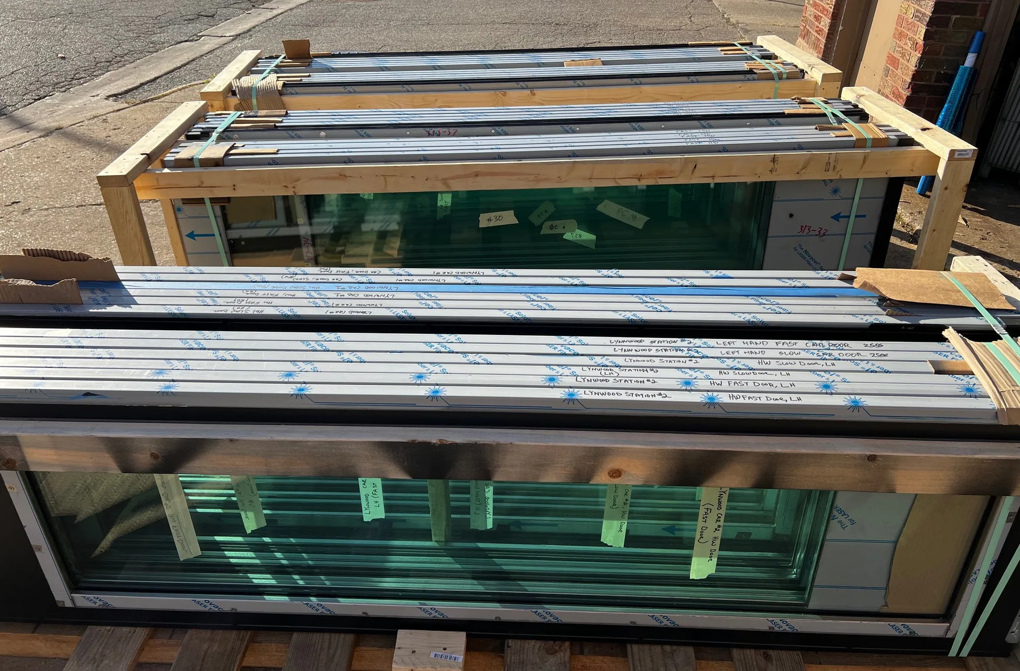 Transit elevator door assemblies arranged in the JV manufacturing shop