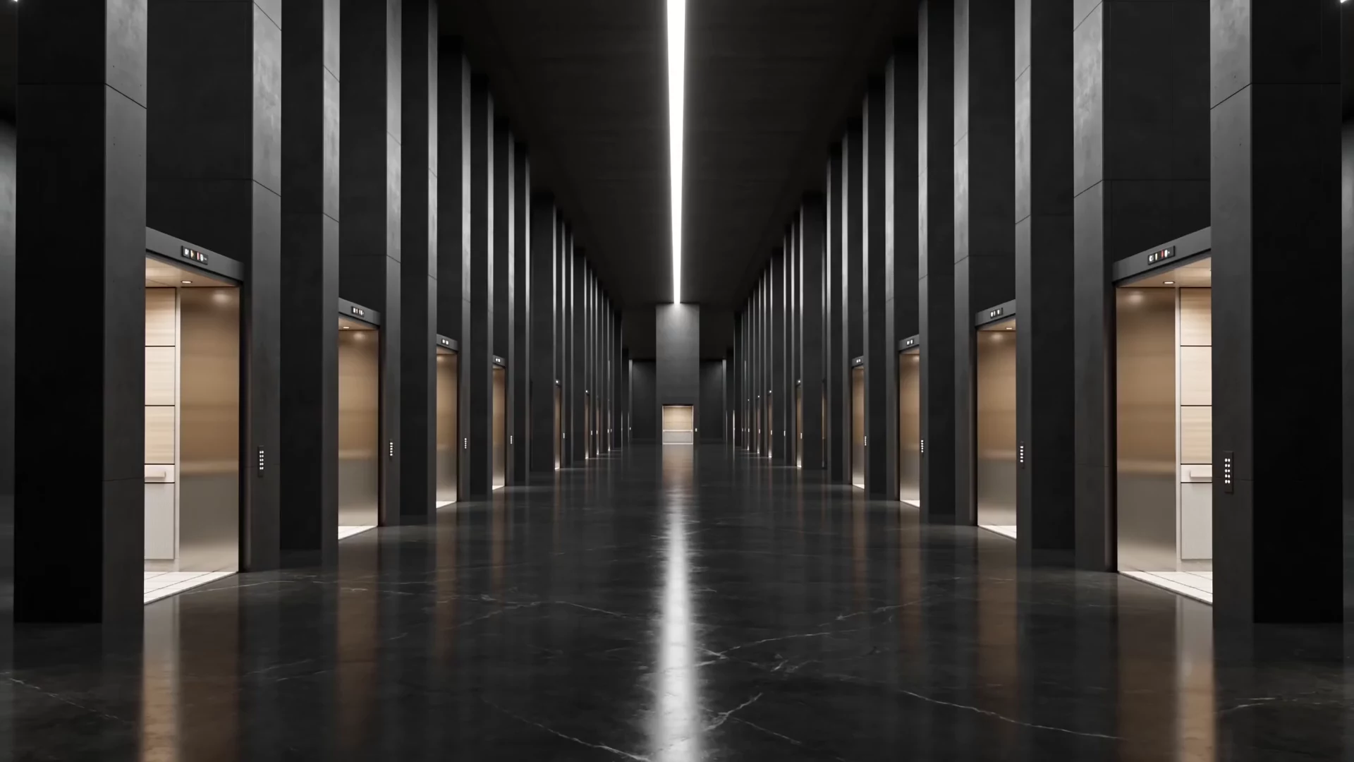 The showroom hallway — lit elevator installations lining both sides of a dark stone aisle.